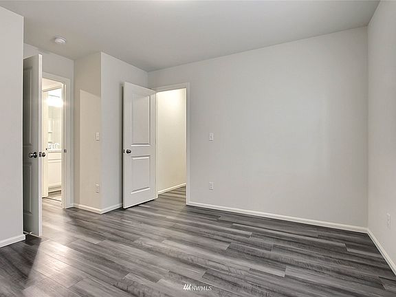Main level bedroom with WIC.