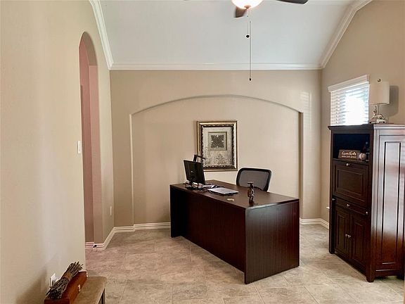 Again, the curved design of the wall add to the elegance of the home. The opening on the left leads you into the kitchen.