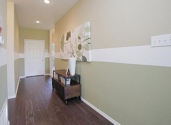 Photo of Model Home with Same Floor Plan, Not of Actual Home Listed