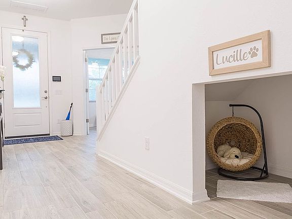 Foyer Stairs & Doggie Room