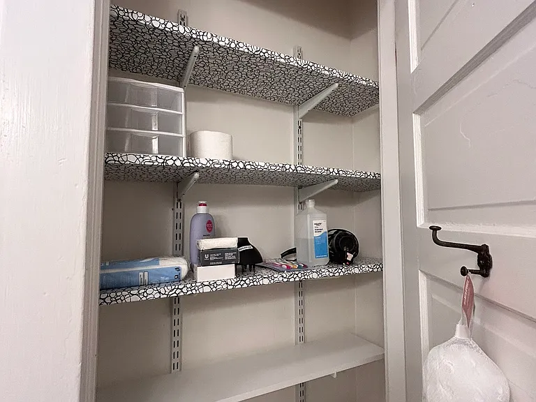 Bath closet, large mirror vanity for storage too.