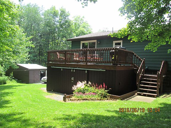 Deck with shed
