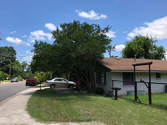 The house is on the corner of Ann Arbor and Holland. Ann Arbor is 1 way at this point which means very little through traffic. Walk past the red truck in the photo and you are at the park! Fenced yard for your furry friend.