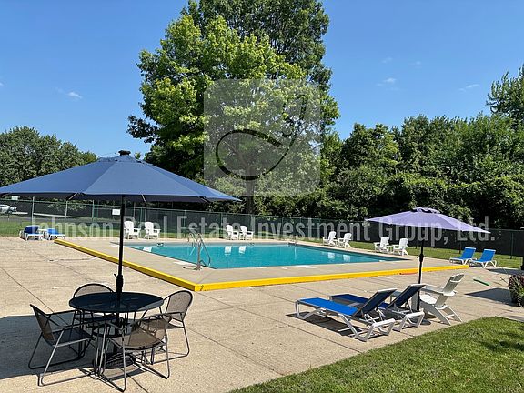 Huge private condo community pool.