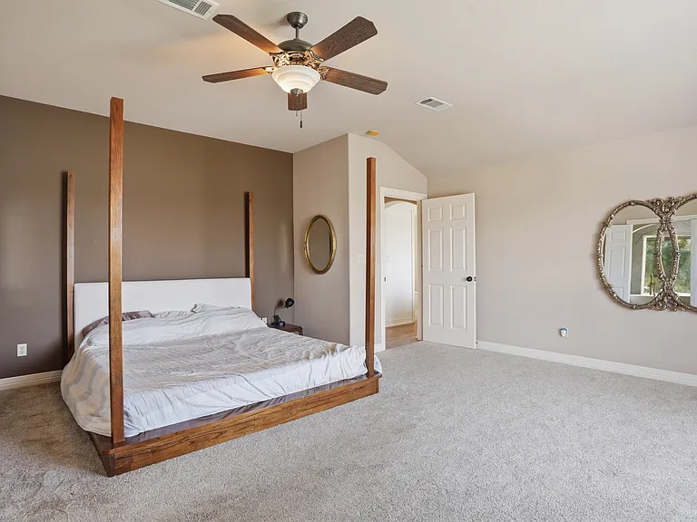 The master bedroom still shows a sample bed that used to be there. The two adjacent rooms have been converted into large window walk-through closets. Not sure you noticed that yet.