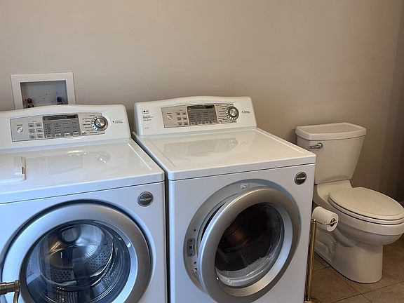 Washer & Dryer Unit inside the bathroom