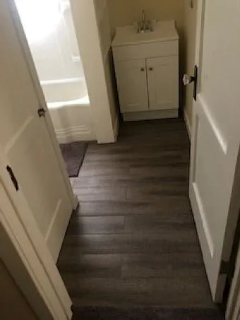 Bathroom with linen closet to left in photo