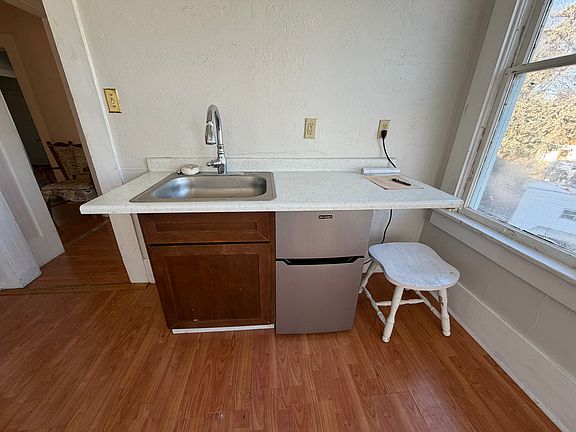 Kitchen with extra under cabinet fridge