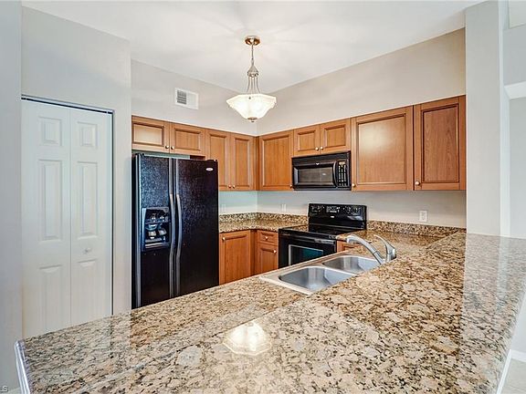 5th image of 20310 Estero Gardens Cir Unit 202