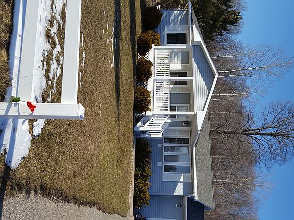 covered  porch/bay window