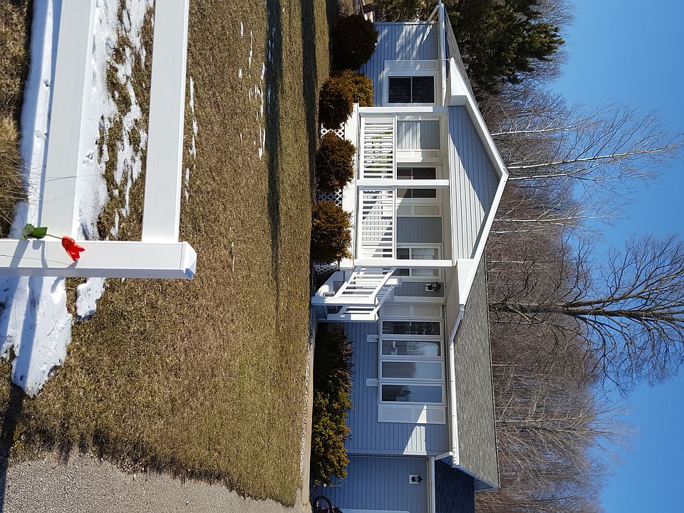 covered  porch/bay window