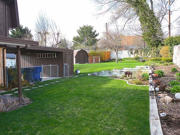 Back yard with extra storage in foreground