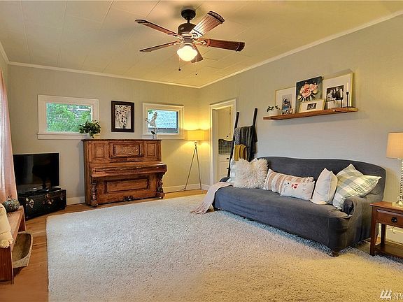 Nice size living room with original hardwood floors.