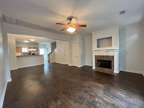 Open concept living area with fireplace