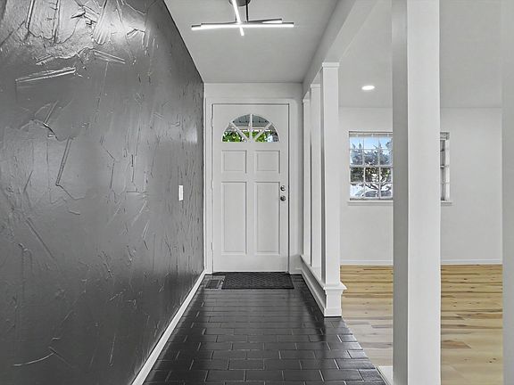 4th image of 9920 E 28th Pl