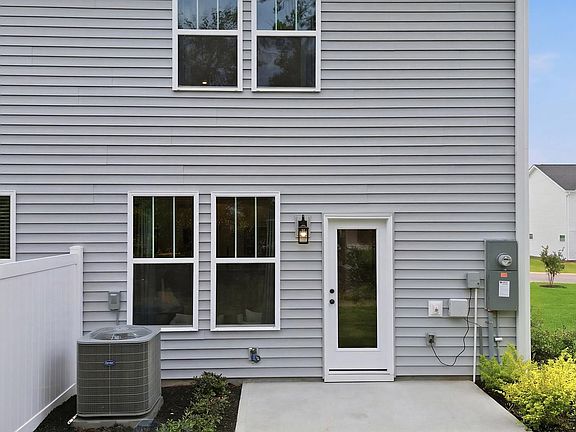 Exclusive backyard with accomplished detail and elevated outdoor living potential at Clarke Townes