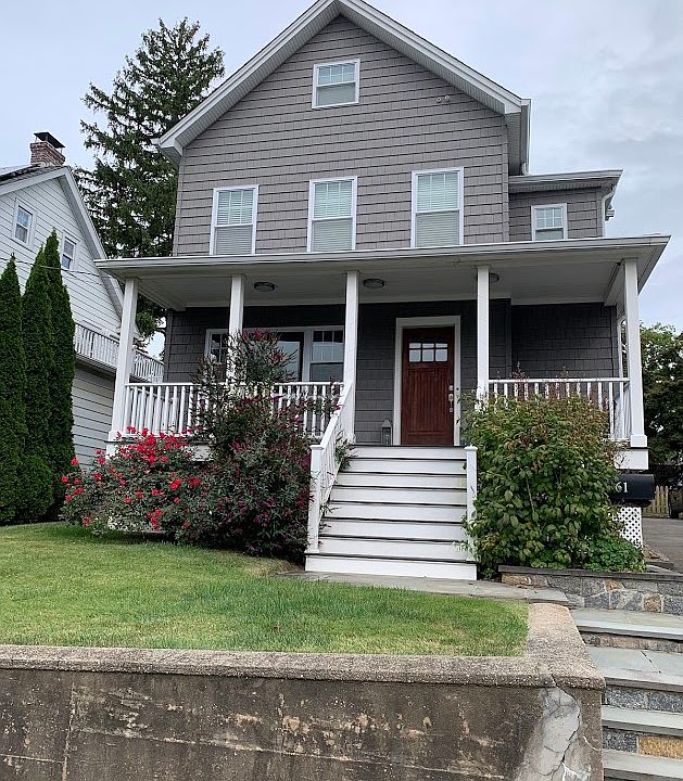 Front of house, driveway with room for 2 to 3 cars to right hand side