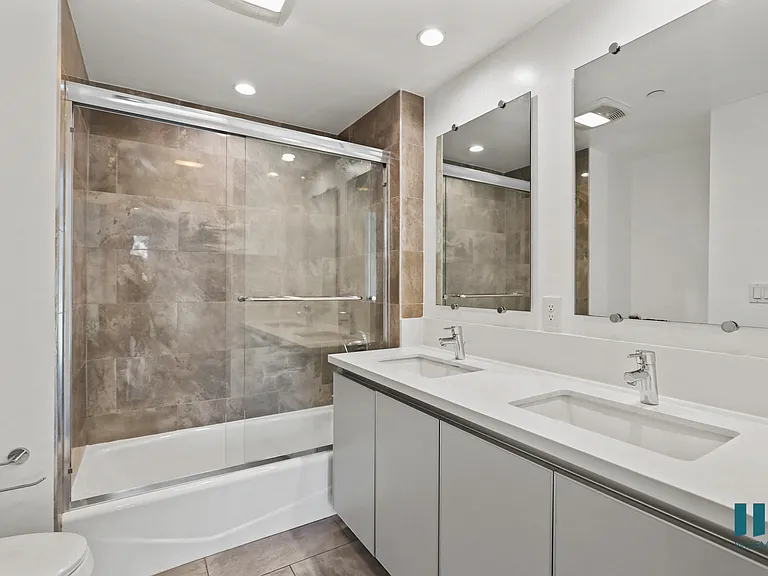 Bathroom with Shower Bath with Glass Door, Double-Sink Vanity with Cabinet Storage