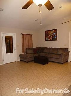 Living room
						:
						Vaulted ceiling, high grade vinyl flooring, mood lighting