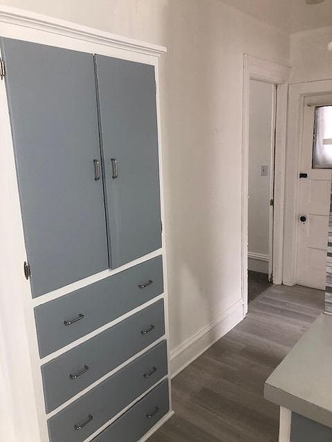 Existing shelving and storage in the upstairs apartment