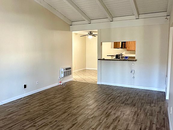 The entry/living area is spacious with vaulted ceilings
