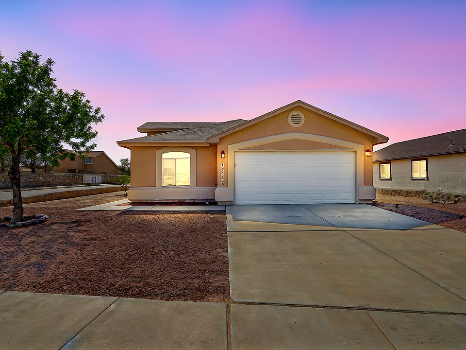 Front view Xeriscape - corner Lot - Two Car Garage