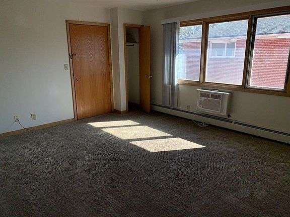 Living room with new carpet.