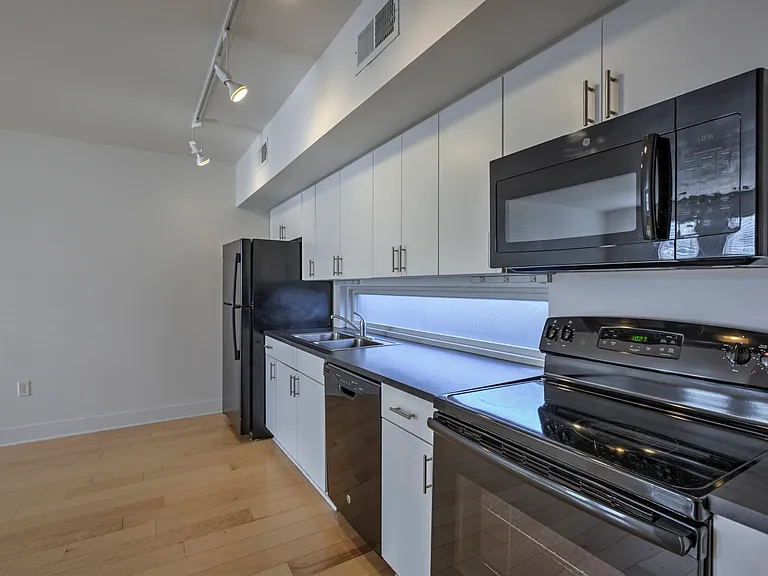 Full size stove in a townhome at The Sawyer.