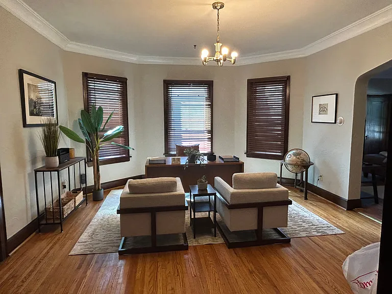 Sit at your large desk with drawers on the back side and plenty of space for a monitor if you have one. The additional seating gives you an executive feel and provides additional seating if needed.