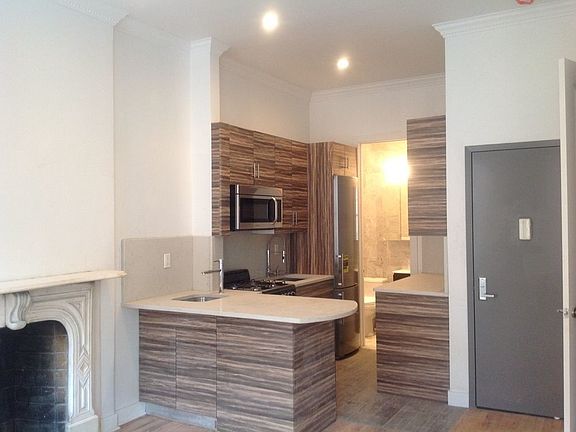 5th image of 408 W 22nd St APT 3F