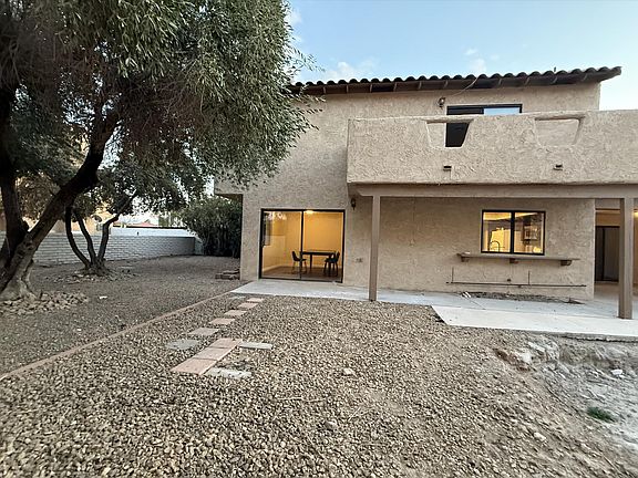 Large Patio more than 6,000 sqft, with many threes and palms. patio furniture Coming Soon!