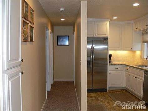 View down the hallway next to the kitchen.