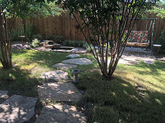 koi pond with 2 waterfalls