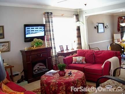 LR to DR Note Crown Molding/Chair Rail
						:
						Neutral wall colors. Couch and matching love seat for sale as well.