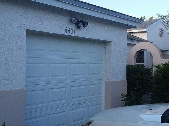 Front of home, one car garage