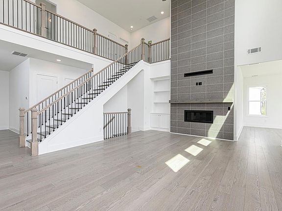 Two-story great room with built-ins