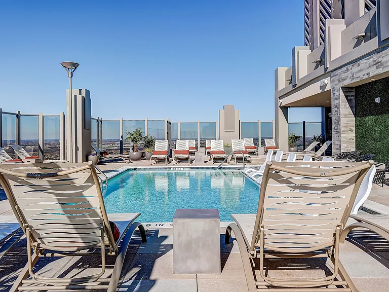 Stunning roof top pool on the sky deck with tanning deck and stunning city views