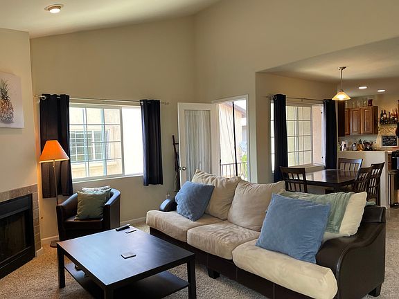 Living room into dining area and kitchen