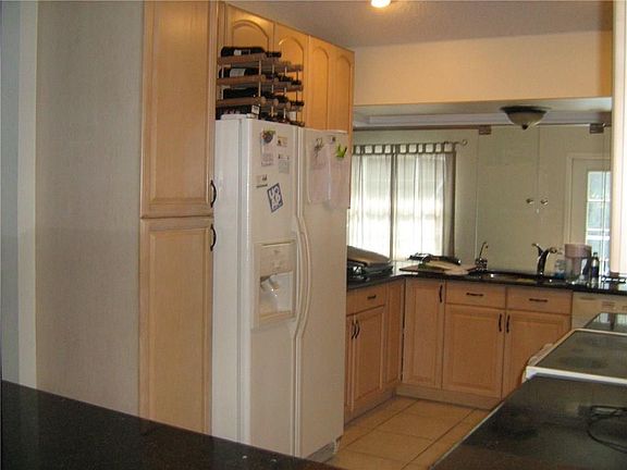 5th image of 8686 SE Algozzini Pl