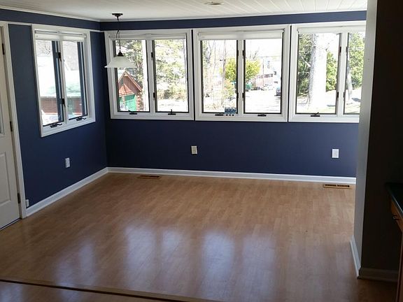 Spacious eating area overlooks lake