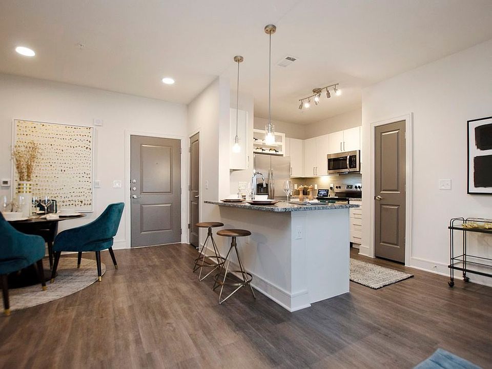 Kitchen and dining area with hard surface flooring
