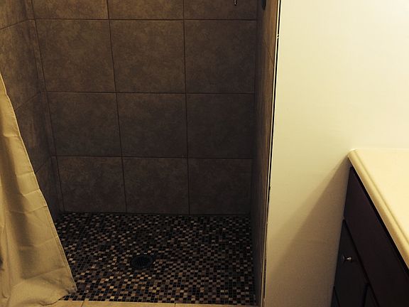 bathroom adjacent to master bedroom