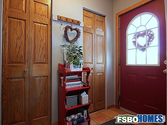Main Entrance with Abundant Storage and Pantry Closet to the Left