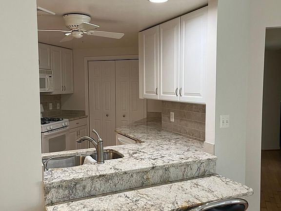 Kitchen with breakfast bar.