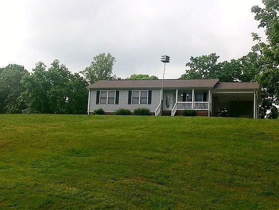 Large hilltop yard overlooking creek in Dickson on Charlotte line