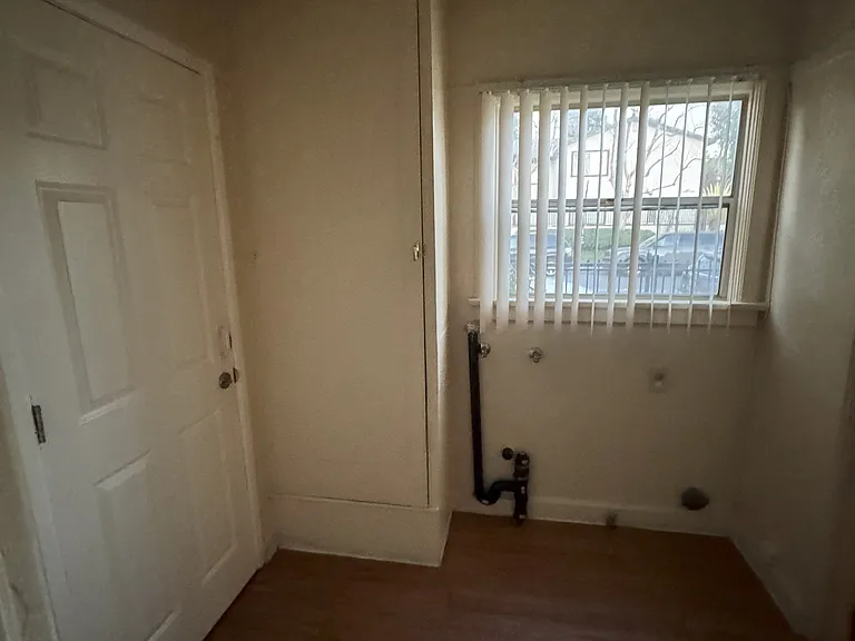 Laundry Hookup and back entrance to nearby parking spot