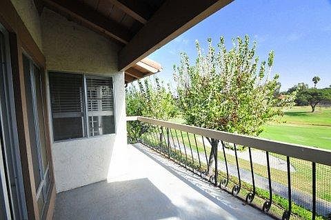 View from balcony showing walking trails around the golf course.