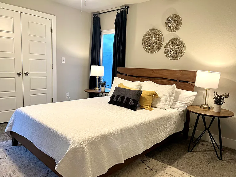 Upstairs Bedroom 3 (Queen bed); private ensuite bathroom, spacious closet, 32" ROKU Smart TV