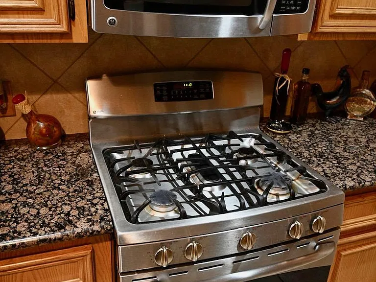 Kitchen - Stainless Steel Stove & Microwave