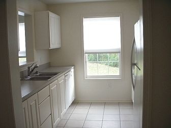 Beautiful Galley Kitchen with Side Window
